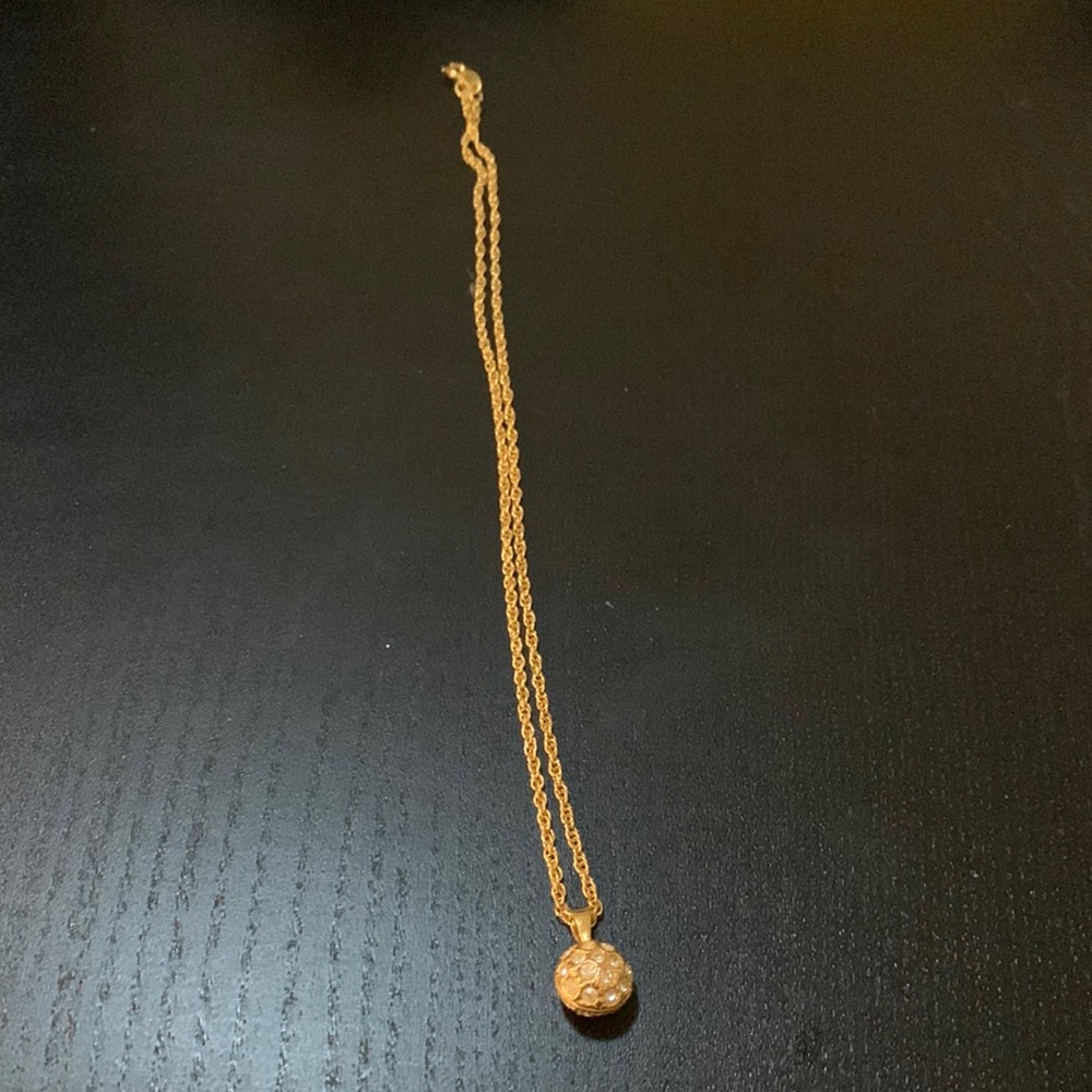 Gold necklace with rhinestone ball
